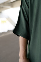 Classic Emerald thobe — fabric and sleeve detail