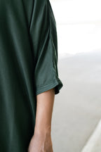 Classic Emerald thobe — sleeve trim detail