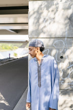 Baby Blue Linen thobe — outdoor angled view