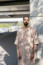 Caramel Linen thobe — outdoor front view