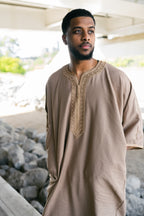 Caramel Linen thobe — outdoor upper-body view