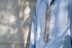 Baby Blue Linen thobe — neckline trim detail