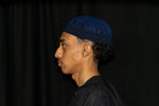 Navy Kufi prayer cap — left side view