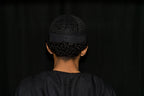 Charcoal Kufi prayer cap — back view