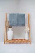 Silver Sajadah prayer mat — front display view