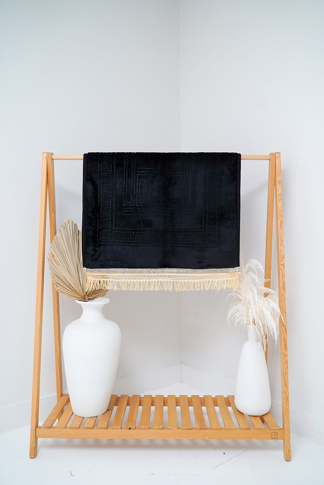 The Charcoal Sajadah