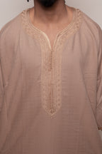 Caramel Linen thobe — studio neckline detail