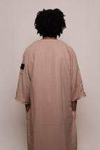 Caramel Linen thobe — studio back view