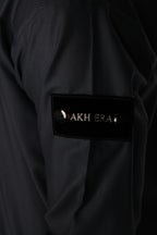 Slate Emirati thobe — sleeve label close-up