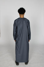 Slate Emirati thobe — full-length back view