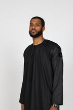 Carbon Emirati thobe — angled front view