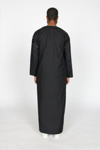 Carbon Emirati thobe — full-length back view