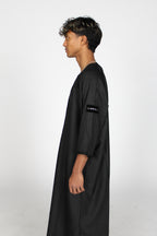 Charcoal Linen thobe — angled side view