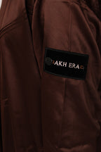 Mocha Emirati thobe — sleeve label detail
